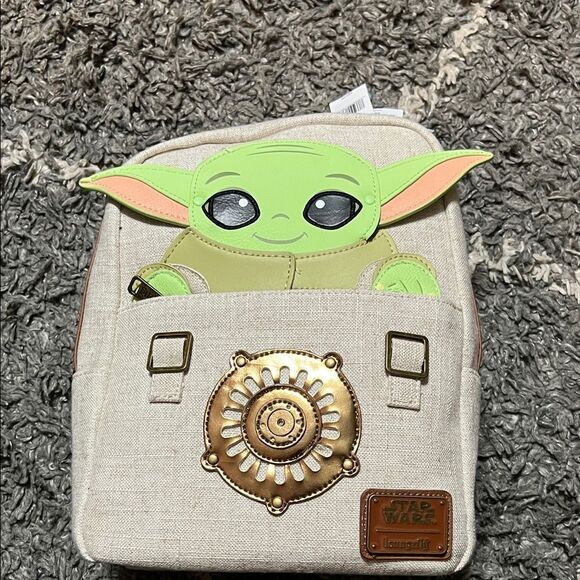 baby yoda mini backpack Star Wars Mandalorian The Child Women's PU with Detachable Coin Purse This adorable mini backpack features a hidden pocket behind an applique in the shape of a bag Loungefly Mandalorian Baby Yoda Mini